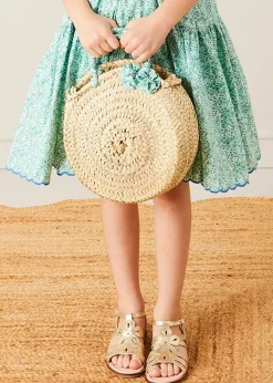 Pepa London Adelaide Floral Tiered Tie Strap Dress in Green (4-12yrs) | Plain Cardigan in Navy (6mths-10yrs) | Metallic Strappy Leather Sandals in Gold (24-35EU) | Adelaide Floral Detail Raffia Bag in Green | Adelaide Floral Small Bow Hair Clip in Green