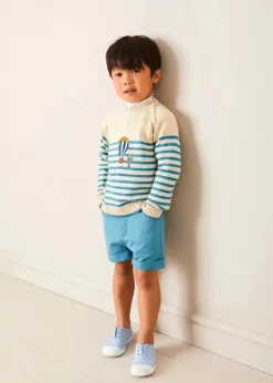 BOY Pepa London Balloon Intarsia Striped Jumper in Beige (12mths-6yrs) | Stafford Striped Mao Collar Long Sleeve Shirt in Yellow (12mths-10yrs) | Plain Elasticated Shorts in Blue (12mths-4yrs) | Canvas Plimsolls in Blue (20-35EU)