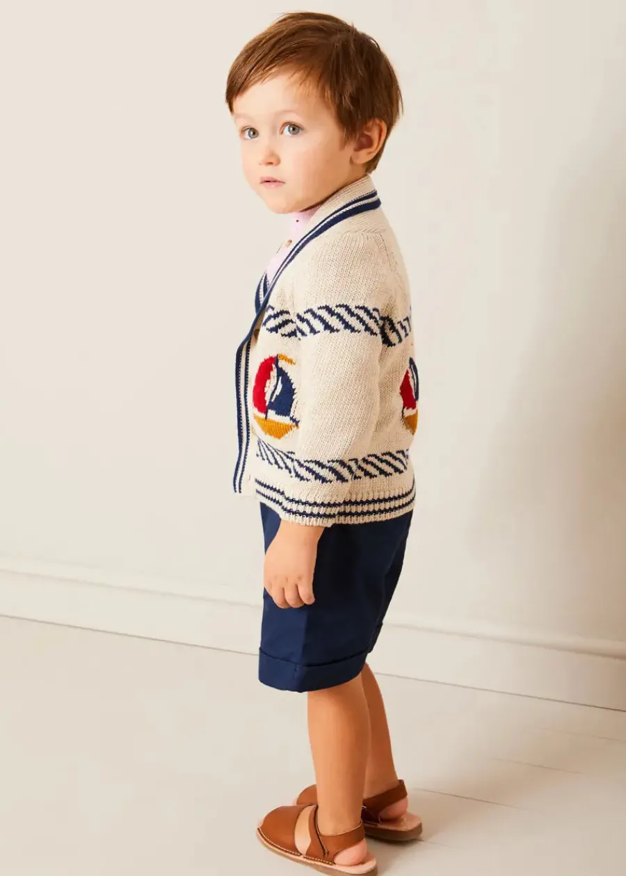 BOY Pepa London Boat Motif Shawl Neck Nautical Cardigan in Beige (2-10yrs) | Lawrence Striped Mao Collar Long Sleeve Shirt in Red (18mths-10yrs) | Classic Turn-up Hem Cotton Shorts in Navy (12mths-4yrs) | Open Toe Leather Sandals in Brown (17-30EU)