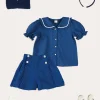Pepa London Broderie Anglaise Statement Collar Short Sleeve Blouse in Blue (4-12yrs) | Broderie Anglais Button Detail Shorts in Blue (4-12yrs) | Plain Cardigan in Navy (6mths-10yrs) | Openwork short socks White (0mths-8yrs) | Navy Linen Big Bow Hairband