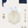 BOY Pepa London Brompton Stripe Romper in Beige (3mths-2yrs) | Openwork Knitted Bonnet in Navy (S-L) | Plain Cardigan in Navy (6mths-10yrs) | Peter Pan Collar Bodysuit in White (0mths-3yrs) | T-Bar Leather Pram Shoes in Ivory (17-20EU) | Ribbed Short Socks in Beige (0mths-10yrs) | Waterford Striped Dummy Clip in Beige | BIBS Dummy in Ivory