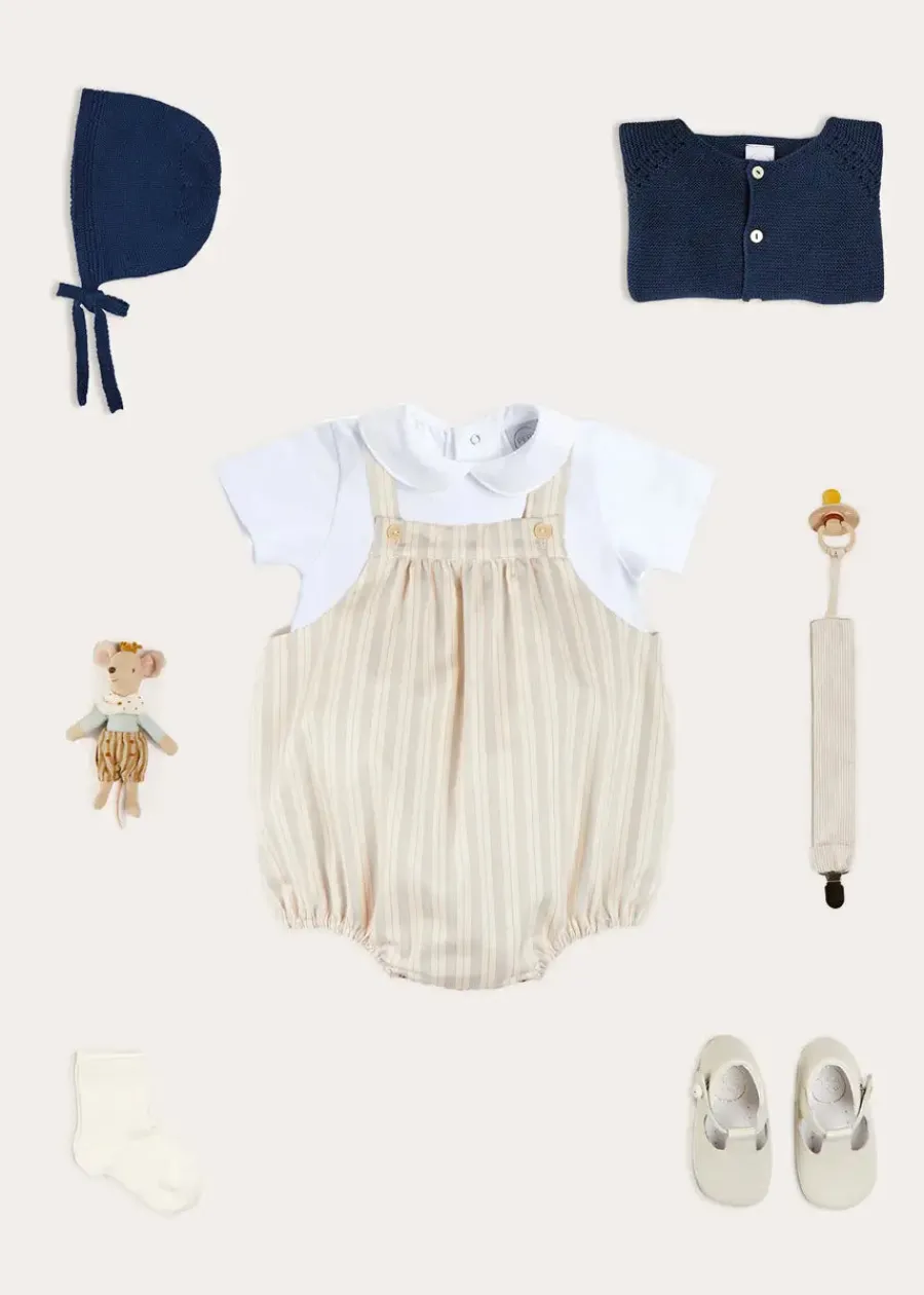 BOY Pepa London Brompton Stripe Romper in Beige (3mths-2yrs) | Openwork Knitted Bonnet in Navy (S-L) | Plain Cardigan in Navy (6mths-10yrs) | Peter Pan Collar Bodysuit in White (0mths-3yrs) | T-Bar Leather Pram Shoes in Ivory (17-20EU) | Ribbed Short Socks in Beige (0mths-10yrs) | Waterford Striped Dummy Clip in Beige | BIBS Dummy in Ivory