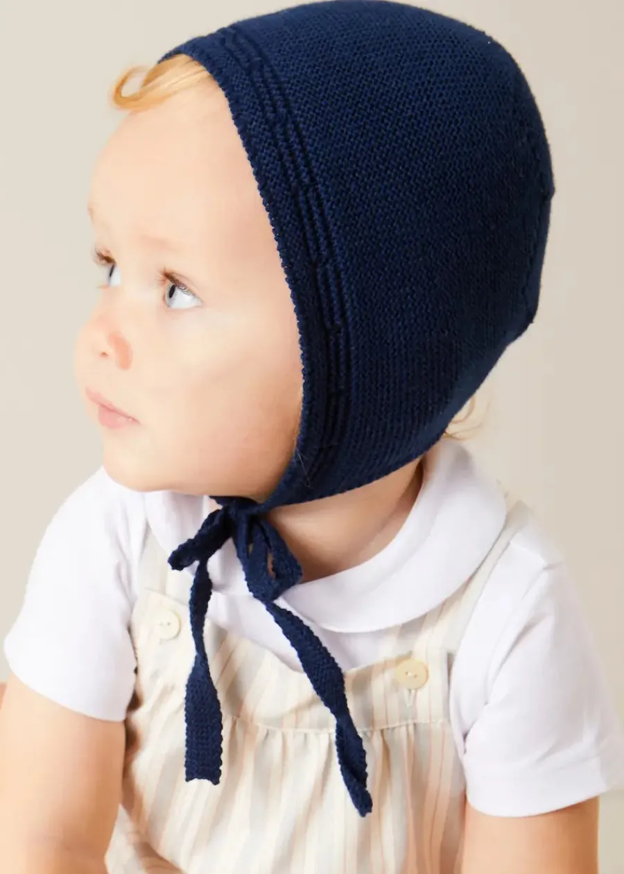 BOY Pepa London Brompton Stripe Romper in Beige (3mths-2yrs) | Openwork Knitted Bonnet in Navy (S-L) | Plain Cardigan in Navy (6mths-10yrs) | Peter Pan Collar Bodysuit in White (0mths-3yrs) | T-Bar Leather Pram Shoes in Ivory (17-20EU) | Ribbed Short Socks in Beige (0mths-10yrs) | Waterford Striped Dummy Clip in Beige | BIBS Dummy in Ivory