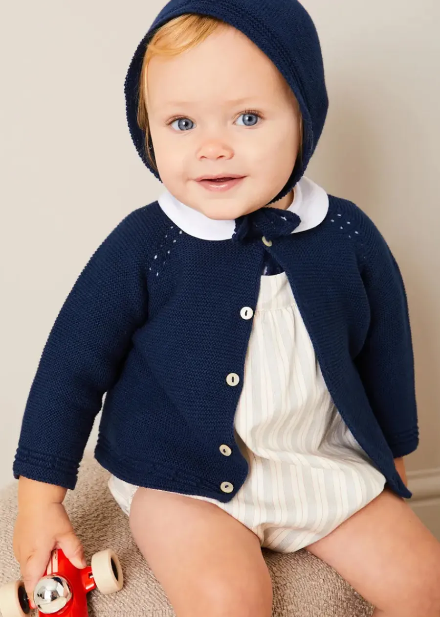 BOY Pepa London Brompton Stripe Romper in Beige (3mths-2yrs) | Openwork Knitted Bonnet in Navy (S-L) | Plain Cardigan in Navy (6mths-10yrs) | Peter Pan Collar Bodysuit in White (0mths-3yrs) | T-Bar Leather Pram Shoes in Ivory (17-20EU) | Ribbed Short Socks in Beige (0mths-10yrs) | Waterford Striped Dummy Clip in Beige | BIBS Dummy in Ivory
