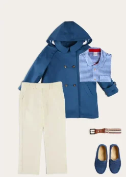 BOY Pepa London Carlisle Gingham Polo Collar Long Sleeve Shirt in Blue (4-10yrs) | Plain Pocket Detail Trousers in White (4-10yrs) | Double Breasted Coat With Detachable Hood in Blue (18mths-10yrs) | Suede Loafers in French Blue (25-34EU) | Beige Striped Belt