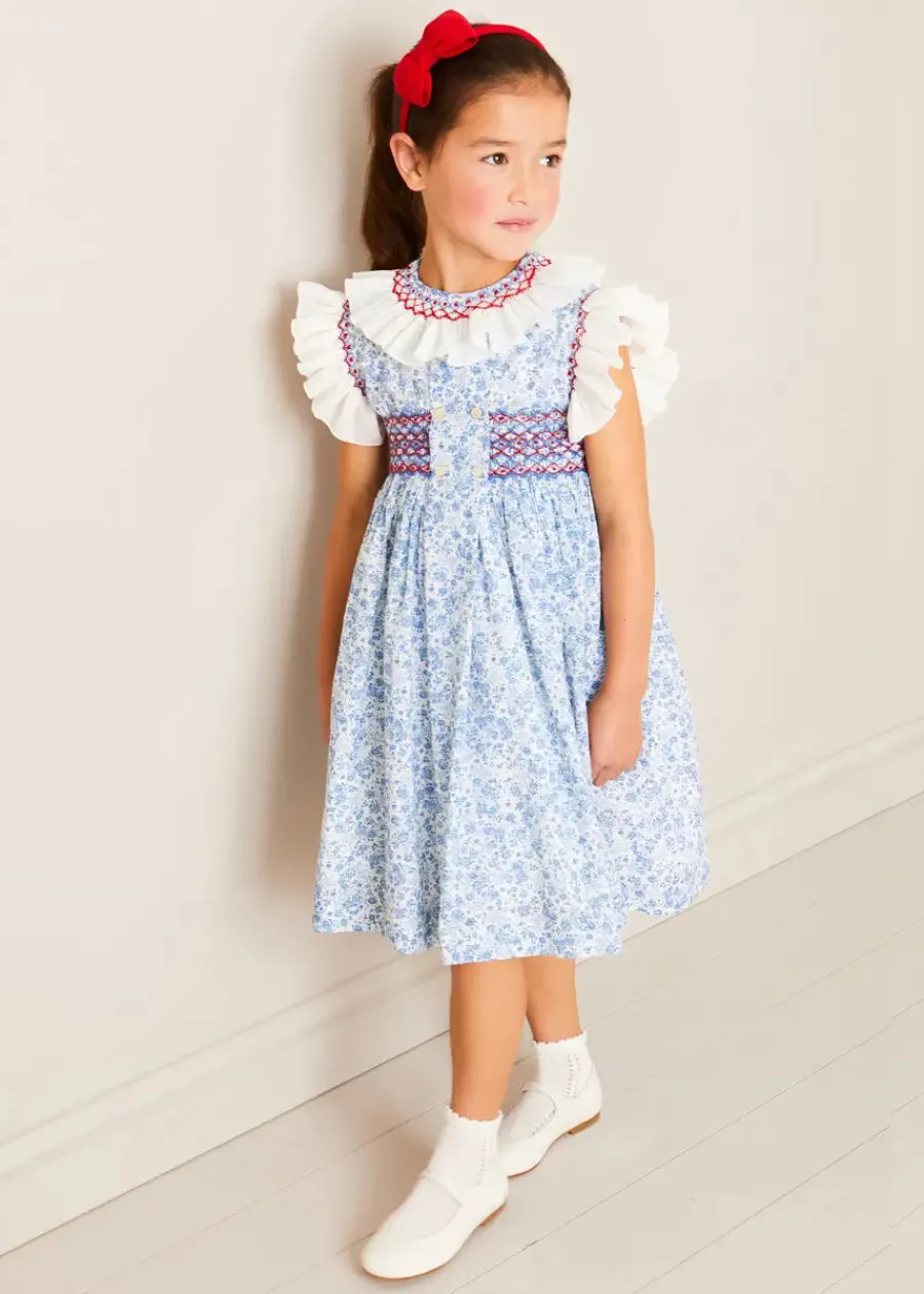 Pepa London Charlotte Floral Hand Smocked Sleeveless Dress in Blue (12mths-10yrs) | Openwork Cotton Cardigan in Cream (6mths-10yrs) | Girls Ivory Leather Mary Jane Shoes (20-34EU) | Plain Linen Hairband in Red | Openwork short socks White (0mths-8yrs)