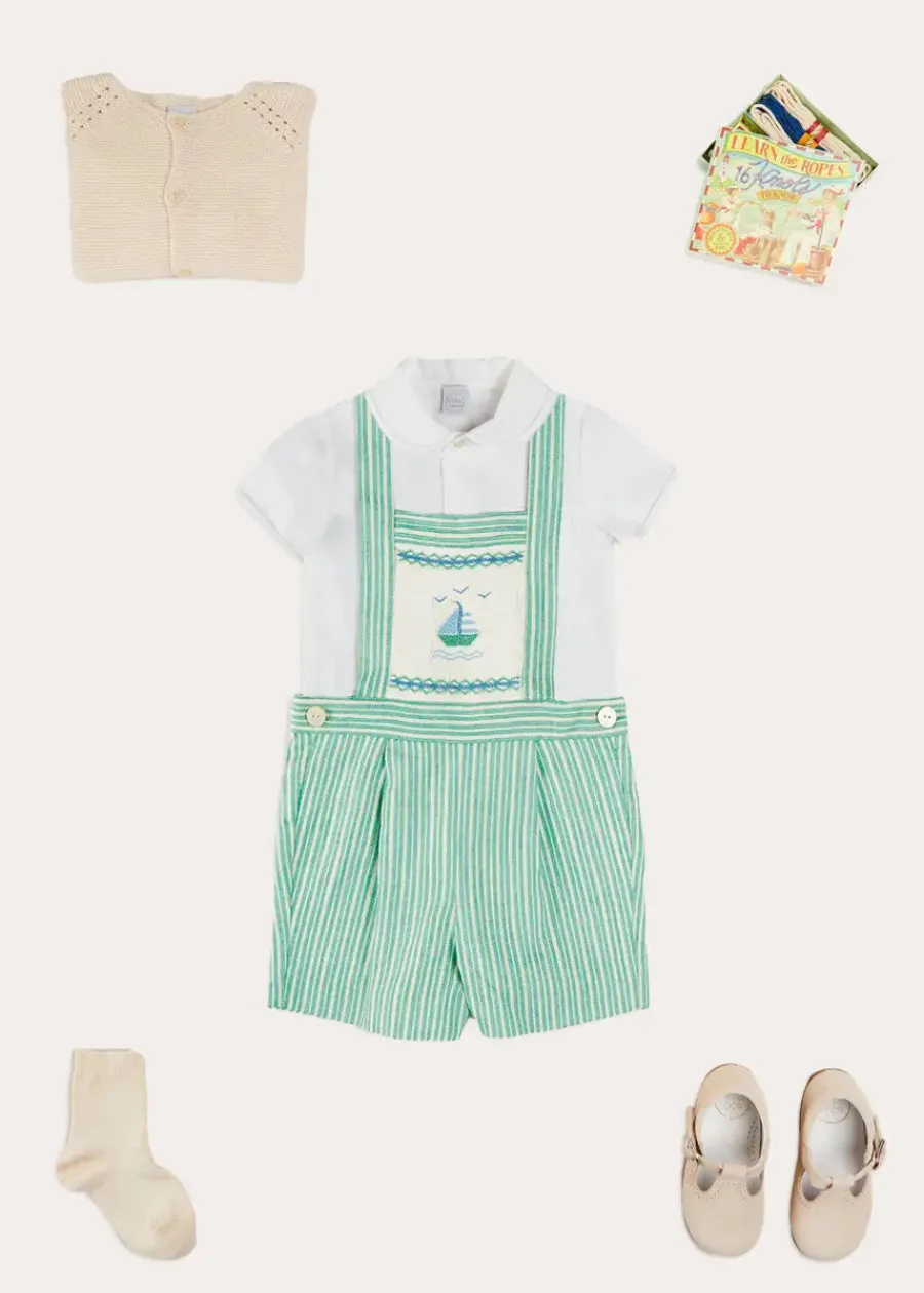 BOY Pepa London Cheyne Striped Boat Embroidery Dungarees in Green (18mths-4yrs) | Peter Pan Collar Trim Detail Short Sleeve Shirt in White (12mths-5yrs) | Plain Cardigan in Cream (6mths-10yrs) | T-Bar Suede Baby Shoes in Beige (20-24EU) | Ribbed Short Socks in Beige (0mths-10yrs)