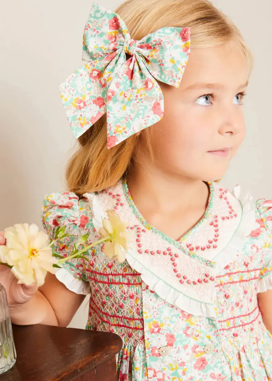 Pepa London Clementine Floral Hand Smocked Double Breasted Short Sleeve Dress in Coral (12mths-10yrs)
