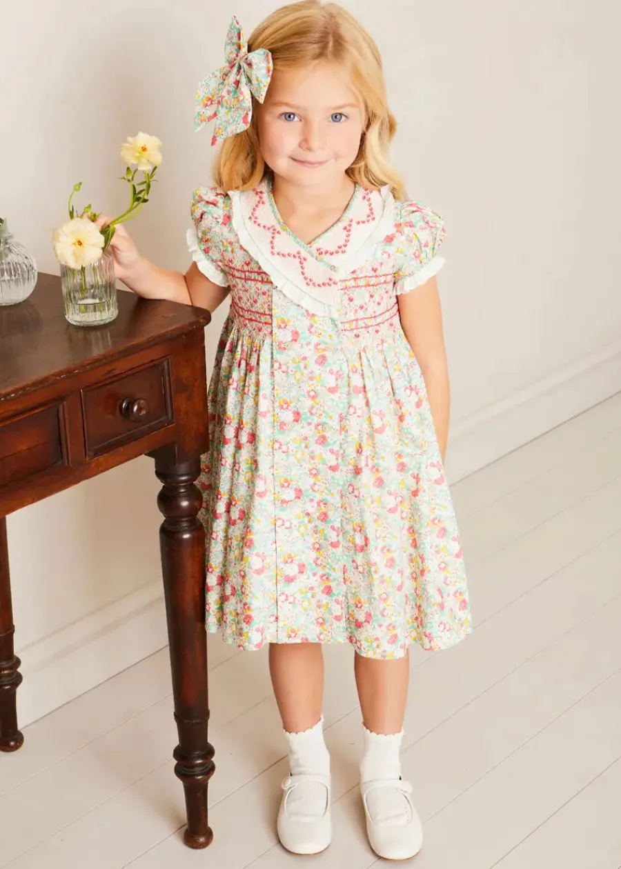 Pepa London Clementine Floral Hand Smocked Double Breasted Short Sleeve Dress in Coral (12mths-10yrs)