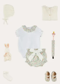 Pepa London Cordelia Embroidered Double Collar Bodysuit in Pink Made with Liberty Fabric (1m-3yrs) | Cordelia Floral Bloomer with Bow in Pink Made with Liberty Fabric (1m-2yrs) | Openwork Cotton Cardigan in Cream (6mths-10yrs) | Openwork Cotton Knitted Bonnet in Cream (S-L) | Cordelia Liberty Floral Mary Jane Pram Shoes in Pink (17-20EU) | Cordelia Liberty Floral Dummy Clip in Pink | Openwork short socks White (0mths-8yrs) | BIBS Dummy in Pink