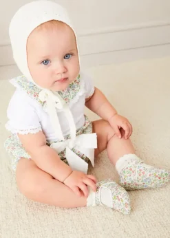 Pepa London Cordelia Embroidered Double Collar Bodysuit in Pink Made with Liberty Fabric (1m-3yrs) | Cordelia Floral Bloomer with Bow in Pink Made with Liberty Fabric (1m-2yrs) | Openwork Cotton Cardigan in Cream (6mths-10yrs) | Openwork Cotton Knitted Bonnet in Cream (S-L) | Cordelia Liberty Floral Mary Jane Pram Shoes in Pink (17-20EU) | Cordelia Liberty Floral Dummy Clip in Pink | Openwork short socks White (0mths-8yrs) | BIBS Dummy in Pink
