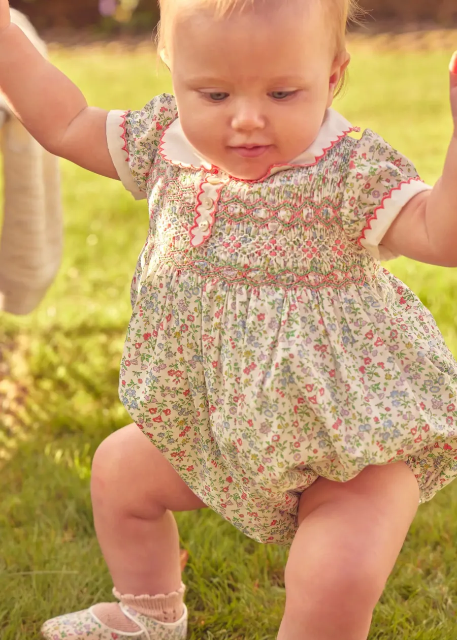 Pepa London Cordelia Floral Hand-Smocked Short Sleeve Romper in Pink Made with Liberty Fabric (3m-2yrs)