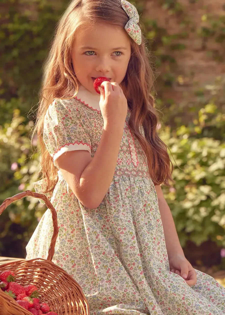 Pepa London Cordelia Floral Hand-Smocked Short Sleeve Dress in Pink Made with Liberty Fabric (12m-6yrs)