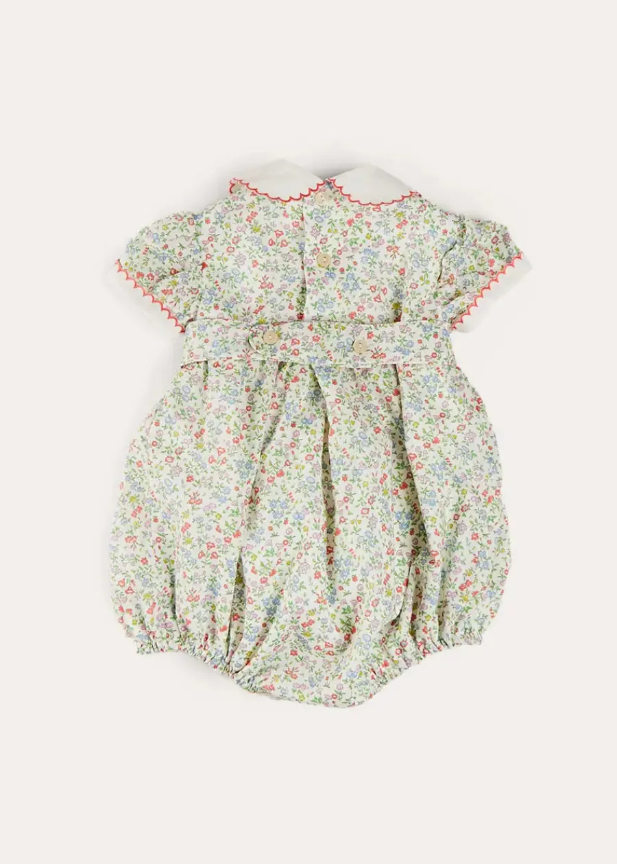 Pepa London Cordelia Floral Hand-Smocked Short Sleeve Romper in Pink Made with Liberty Fabric (3m-2yrs)