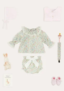 Pepa London Cordelia Floral Long Sleeve Blouse in Pink Made with Liberty Fabric (1-12m) | Cordelia Floral Bloomer with Bow in Pink Made with Liberty Fabric (1m-2yrs) | Openwork Detail Baby Cardigan in Pink (1-12mths) | Lace Detail Knitted Bonnet in Pink (1-12mths) | Lace Detail Knitted Booties in Pink | Cordelia Liberty Floral Dummy Clip in Pink | BIBS Dummy in Pink