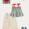 Pepa London Evelyn Floral Smock Detail Tie Strap Blouse in Red (4-10yrs) | Wide Leg Front Button Trousers in Beige (2-10yrs) | Mariner Collar Bold Stripe Jumper in White (2-10yrs) | Plain Linen Small Bow Hair Clip in Red