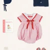 Pepa London Lawrence Striped Mariner Collar Short Sleeve Romper in Red (6mths-3yrs) | Openwork Knitted Bonnet in Navy (S-L) | Plain Cardigan in Navy (6mths-10yrs) | Leather Mary Jane Pram Shoes in Red (17-20EU) | Openwork short socks White (0mths-8yrs)