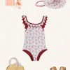 Pepa London Louisa Floral Ruffle Trim Swimsuit in Pink (2-10yrs) | Louisa Floral Beach Hat in Pink (S-M) | Louisa Floral Detail Raffia Bag in Coral | Leather Buckle Detail Sandals in Camel (24-34EU)
