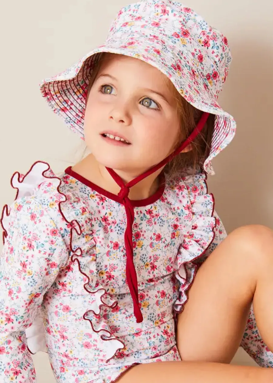 Pepa London Louisa Floral Ruffle Trim Long Sleeve Swimsuit in Pink (2-10yrs) | Louisa Floral Beach Hat in Pink (S-M) | Open Toe Leather Sandals in Brown (17-30EU) | Louisa Floral Detail Raffia Bag in Coral