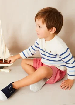 BOY Pepa London Lyall Stripe Anchor Motif Mariner Collar Short Sleeve Shirt in Blue (12mths-6yrs) | Striped Crewneck Button Detail Jumper in Blue (12mths-10yrs) | Plain Linen Toddler Shorts in Red (12mths-4yrs) | Canvas Plimsolls in Navy (20-35EU)