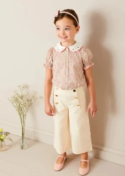 Pepa London Mabel Floral Embroidered Short Sleeve Blouse in Coral (18mths-10yrs) | Wide Leg Front Button Trousers in Beige (2-10yrs) | Floral Openwork Cotton Cardigan in Pink (2-10yrs) | Openwork short socks - Dusty Pink (0mths-10yrs) | Leather Mary Jane Shoes in Pink (24-34EU) | Mabel Floral Hairband in Coral