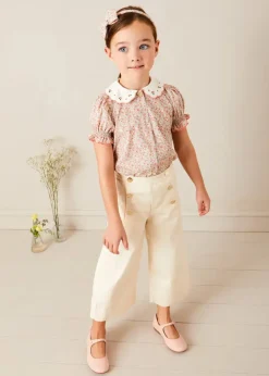 Pepa London Mabel Floral Embroidered Short Sleeve Blouse in Coral (18mths-10yrs) | Wide Leg Front Button Trousers in Beige (2-10yrs) | Floral Openwork Cotton Cardigan in Pink (2-10yrs) | Openwork short socks - Dusty Pink (0mths-10yrs) | Leather Mary Jane Shoes in Pink (24-34EU) | Mabel Floral Hairband in Coral