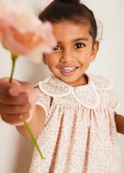 Pepa London Mabel Floral Statement Collar Short Sleeve Dress in Coral (12mths-10yrs) | Plain Cardigan in Cream (6mths-10yrs) | Mary Jane Baby Shoes in Pink (20-26EU) | Mabel Floral Hairband in Coral | Openwork short socks White (0mths-8yrs)