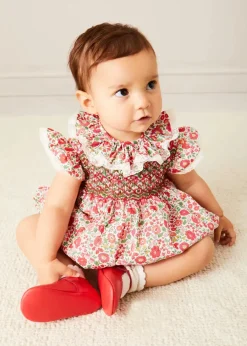 Pepa London Margot Floral Romper in Red Made with Liberty Fabric (6m-2yrs) | Openwork Cotton Cardigan in Cream (6mths-10yrs) | Openwork Cotton Knitted Bonnet in Cream (S-L) | Leather Mary Jane Pram Shoes in Red (17-20EU) | Margot Dummy Clip in Red Made with Liberty Fabric | Openwork short socks White (0mths-8yrs) | BIBS Dummy in Pink