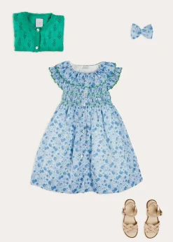 Pepa London Olivia Floral Smocked Ruffle Collar Sleeveless Dress in Blue (12mths-10yrs) | Floral Openwork Cotton Cardigan in Green (2-10yrs) | Leather Woven Detail Sandals in Beige (24-35EU) | Olivia Floral Medium Bow Hair Clip in Blue