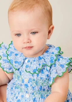 Pepa London Olivia Floral Smocked Ruffle Collar Sleeveless Romper in Blue (6mths-2yrs) | Plain Cardigan in Navy (6mths-10yrs) | Openwork Knitted Bonnet in Navy (S-L) | Olivia Floral Mary Jane Pram Shoes in Blue (17-20EU) | Openwork short socks White (0mths-8yrs) | Flower Fairies of the Summer Book in White