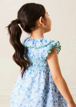 Pepa London Olivia Floral Smocked Ruffle Collar Sleeveless Dress in Blue (12mths-10yrs) | Floral Openwork Cotton Cardigan in Green (2-10yrs) | Leather Woven Detail Sandals in Beige (24-35EU) | Olivia Floral Medium Bow Hair Clip in Blue