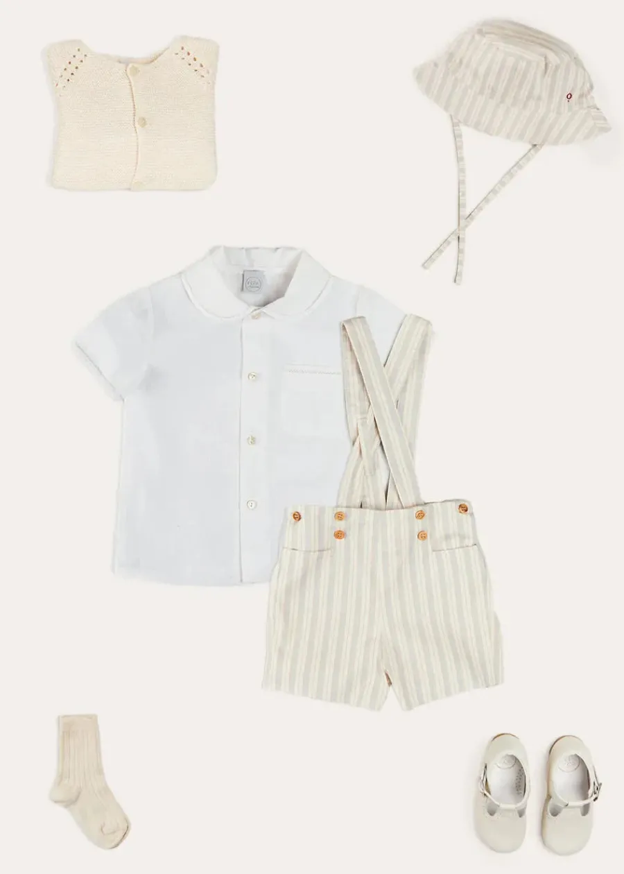 BOY Pepa London Peter Pan Collar Trim Detail Short Sleeve Shirt in White (12mths-5yrs) | Brompton Striped Shorts With Braces in Beige (12mths-4yrs) | T-Bar Leather Baby Shoes in Ivory (20-24EU) | Brompton Striped Sun Hat in Beige (XS-M) | Ribbed Short Socks in Beige (0mths-10yrs)