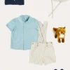 BOY Pepa London Peter Pan Collar Trim Detail Short Sleeve Shirt in Blue (12mths-5yrs) | Brompton Striped Shorts With Braces in Beige (12mths-4yrs) | Plain Cardigan in Navy (6mths-10yrs) | Woven T-Bar Baby Shoes in Navy (20-26EU) | Brompton Striped Sun Hat in Beige (XS-M) | Ribbed Short Socks - Cream (0mths-10yrs)