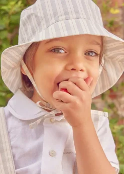 BOY Pepa London Peter Pan Collar Trim Detail Short Sleeve Shirt in White (12mths-5yrs) | Brompton Striped Shorts With Braces in Beige (12mths-4yrs) | T-Bar Leather Baby Shoes in Ivory (20-24EU) | Brompton Striped Sun Hat in Beige (XS-M) | Ribbed Short Socks in Beige (0mths-10yrs)
