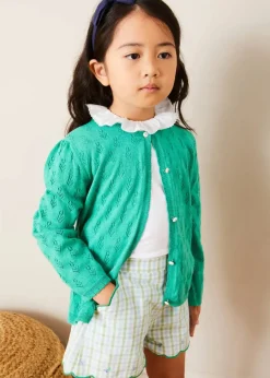 Pepa London Piculina Trim Top in White (2-10yrs) | Maxwell Gingham Scallop Trim Embroidered Shorts in Green (18mths-10yrs) | Floral Openwork Cotton Cardigan in Green (2-10yrs) | Leather Woven Detail Sandals in Beige (24-35EU) | Navy Linen Big Bow Hairband | Flower Fairies of the Summer Book in White