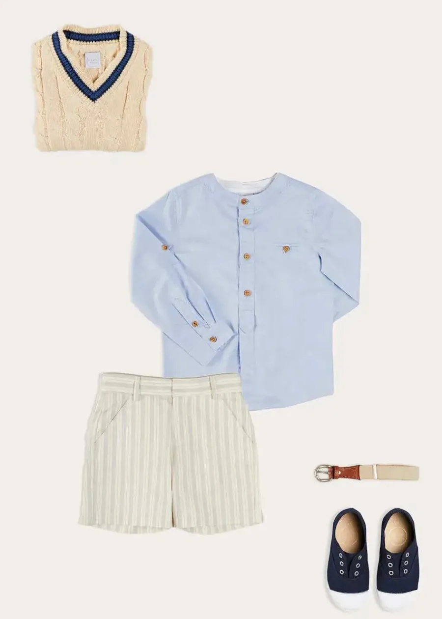 BOY Pepa London Plain Mao Collar Long Sleeve Shirt in Blue (4-10yrs) | Brompton Striped Shorts in Beige (4-10yrs) | Cable Knit V-Neck Jumper in Cream (4-10yrs) | Canvas Plimsolls in Navy (20-35EU) | Cream Boy's Belt