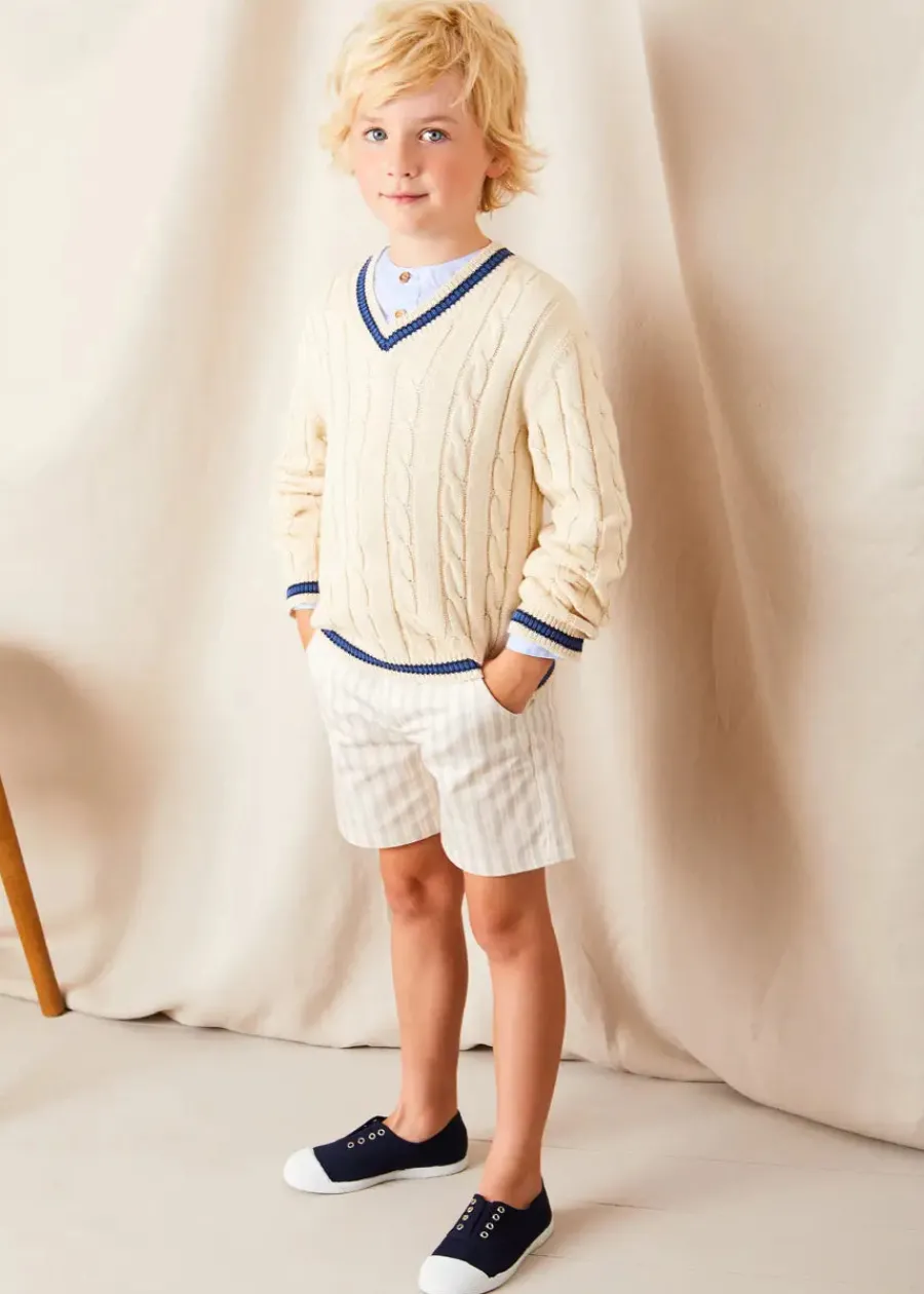BOY Pepa London Plain Mao Collar Long Sleeve Shirt in Blue (4-10yrs) | Brompton Striped Shorts in Beige (4-10yrs) | Cable Knit V-Neck Jumper in Cream (4-10yrs) | Canvas Plimsolls in Navy (20-35EU) | Cream Boy's Belt