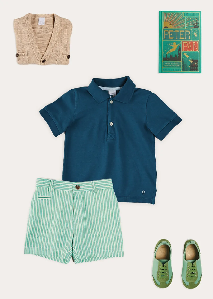 BOY Pepa London Plain Short Sleeve Polo Shirt in Navy (2-10yrs) | Cheyne Striped Pocket Detail Shorts in Green (4-10yrs) | Safari Button Detail Cardigan in Camel (4-10yrs) | Canvas Lace Up Plimsols in Green (23-35EU) | Peter Pan Book