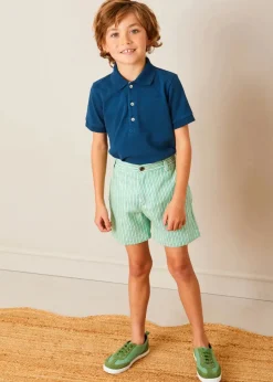 BOY Pepa London Plain Short Sleeve Polo Shirt in Navy (2-10yrs) | Cheyne Striped Pocket Detail Shorts in Green (4-10yrs) | Safari Button Detail Cardigan in Camel (4-10yrs) | Canvas Lace Up Plimsols in Green (23-35EU) | Peter Pan Book