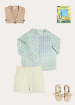 BOY Pepa London Safari Button Detail Cardigan in Camel (4-10yrs) | Maxwell Gingham Mao Collar Long Sleeve Shirt in Green (3-10yrs) | Plain Cotton Shorts in White (4-10yrs) | Suede Lace-up Espadrilles in Beige (24-35EU) | The Christopher Robin Collection Book