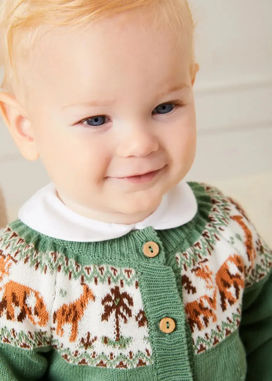 BOY Pepa London Safari Intarsia Cardigan in Green (6mths-6yrs) | Waterford Striped Polo Collar Short Sleeve Top in Beige (12mths-4yrs) | Striped Button Detail Bloomers in Beige (3mths-3yrs) | Suede T-Bar Pram Shoes in Beige (17-20EU) | Ribbed Short Socks in Beige (0mths-10yrs) | Little People, Big Dreams - David Attenborough Book in Green | Waterford Striped Dummy Clip in Beige | BIBS Dummy in Ivory